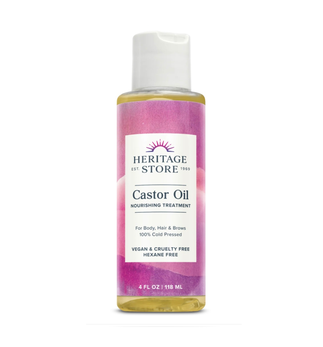 Organic Heritage Store castor oil in a glass bottle, shown alongside a dropper, ideal for skin, hair, and deep hydration.