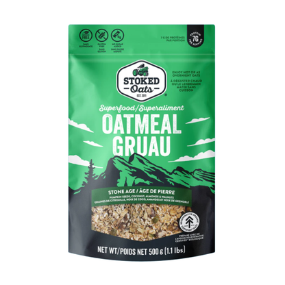 Stoked Oats Mountain Maple oatmeal blend in 500g package, showcasing a bowl of prepared oatmeal with maple syrup and oats.