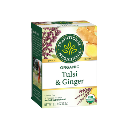 Traditional Medicinals herbal tea box with 16 tea bags, featuring natural packaging and fresh tea leaves.
